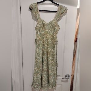 Green dress with green, blue, and brown pattern, size 6 NWOT